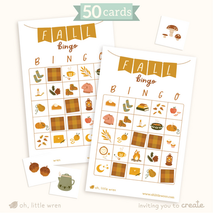 shows 2 print at home fall themed bingo cards, featuring our cozy fall illustrations-like sweaters, socks, and fall leaves. scattered calling cards show mushrooms, acorns, and a tea kettle. text reads: 50 cards.