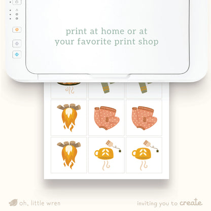 page of fall memory game matching squares being shown printed from a printer with text 'print at home or at your favorite print shop'